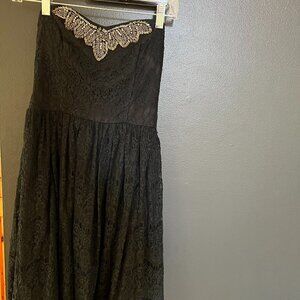 black strapless lace dress with sequin pattern